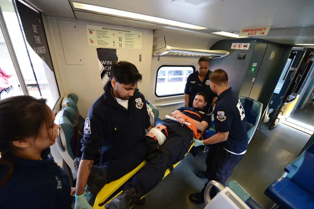 Paramedic students at LaGuardia Community College held a mock disaster drill at the MTA Long Island Rail Road Long Island City yard on Fri., June 14, 2013. Students took turns portraying passengers with varying degrees of injury sustained in a train collision while others assessed, triaged, and trea. Nemt discovery call with the guesswork removed