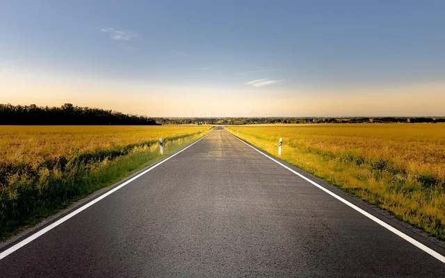road, countryside, rural, highway, country road, landscape, road, road, highway, highway, highway, country road, country road, country road, country road, country road. Routing around hospital closures in rural Georgia for NEMT providers