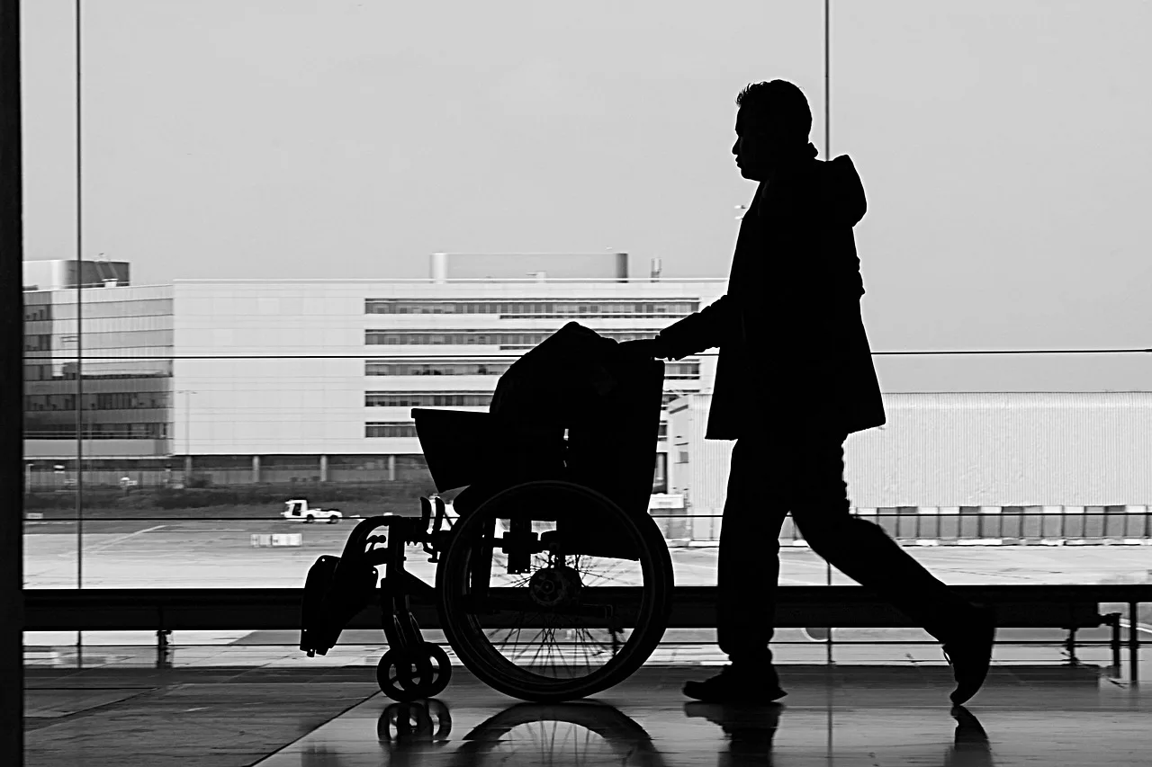 man, wheelchair, shadow, disabled, wheel, black and white, urban, urban landscape, characters, unusual, wheelchair, wheelchair, wheelchair, wheelchair, wheelchair, disabled, disabled. Packaging nemt services customers understand