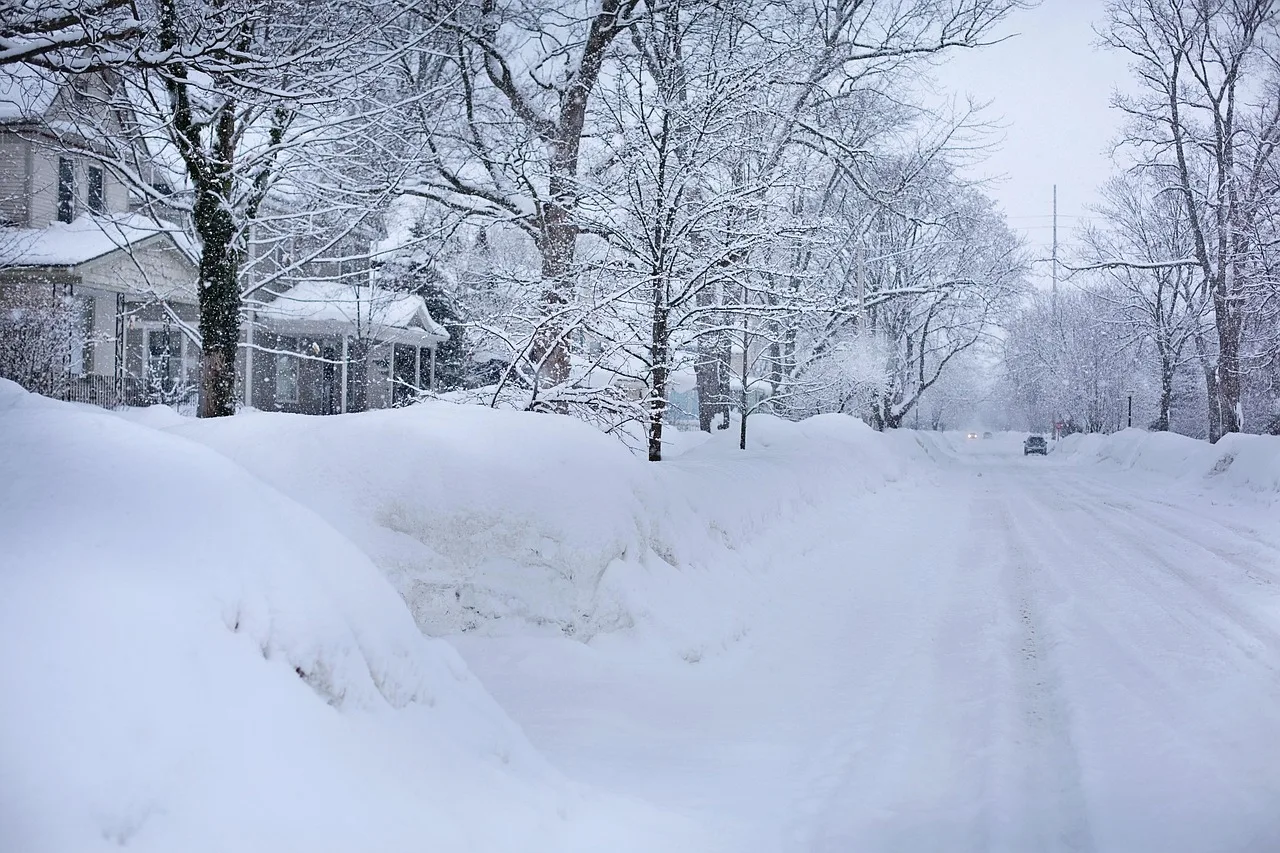 snowy street, nature, deep snow, winter, michigan, icy, freeze, cold, snow, blue street. How winter weather in the Midwest reshapes NEMT routing and fleet plans