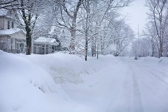 snowy street, nature, deep snow, winter, michigan, icy, freeze, cold, snow, blue street. How winter weather in the Midwest reshapes NEMT routing and fleet plans